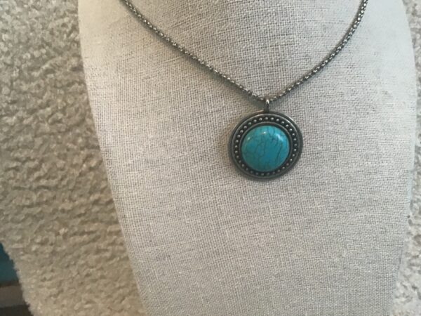Circular Turquoise and Silver colored necklace - Image 2
