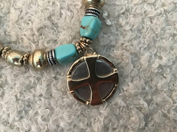 Cross/Coin Bracelet Depicting Palm Tree