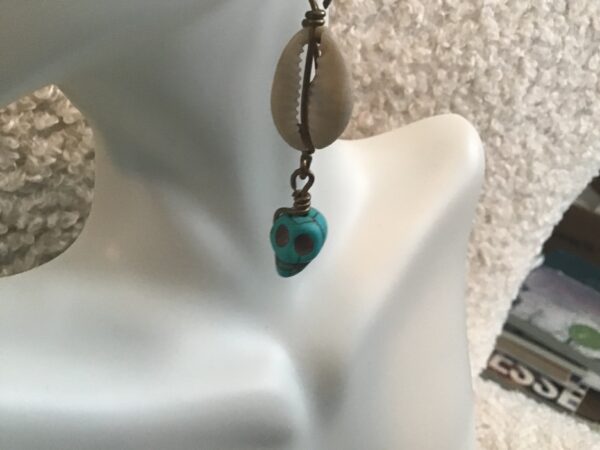Cowrie Shell and Turquoise Colored Skull Earrings - Image 2