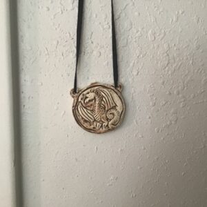 Round Off White Dragon Necklace