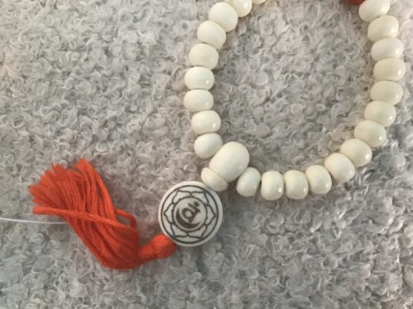 Sacral Chakra White Bead Orange Tassel Bracelet