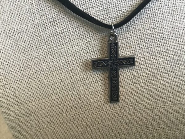 Silver Colored and Black Cross Pendant