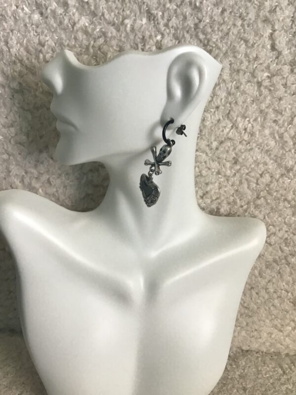 Skull and Crossbones Over Black and Silver Colored Hearts Earrings - Image 3