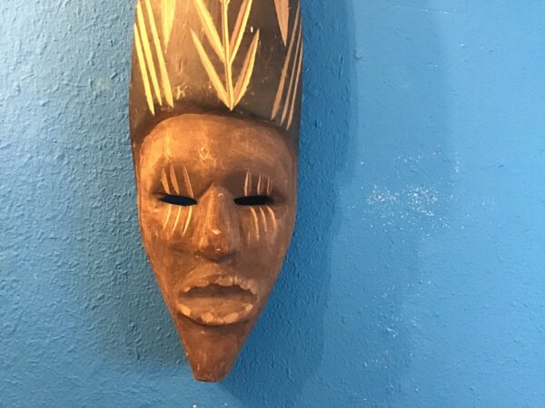 Brown and Black Light Wood Wall Mask